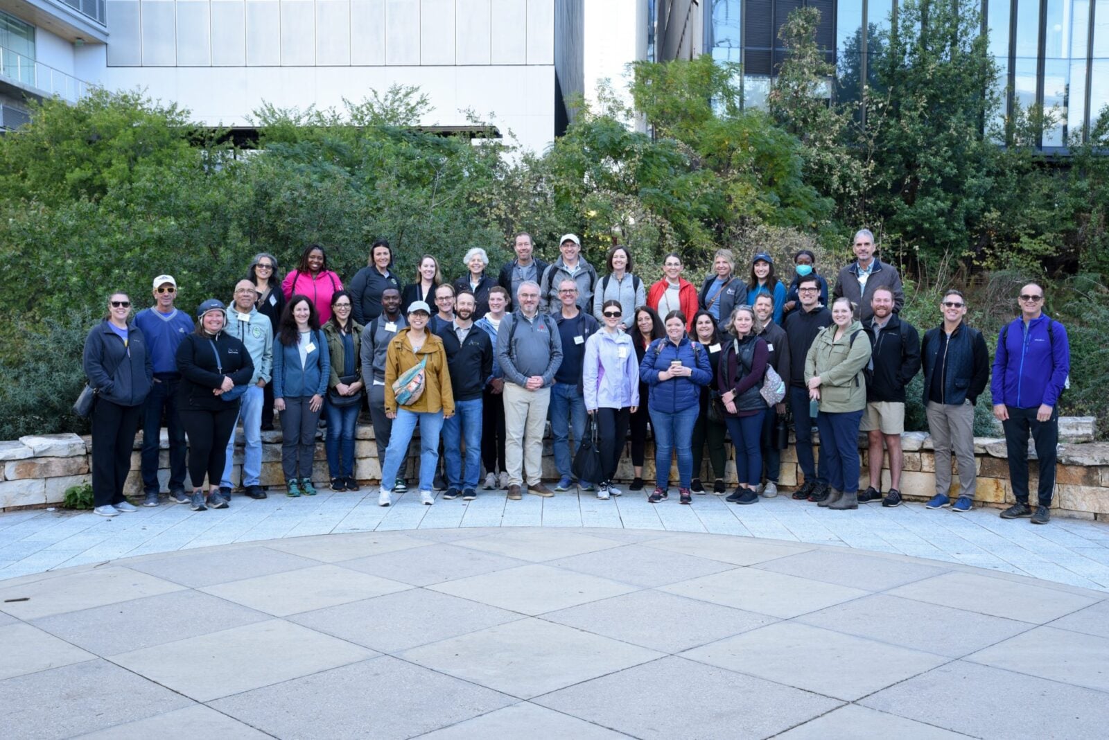Park Study Tour attendees posing in a park plaza