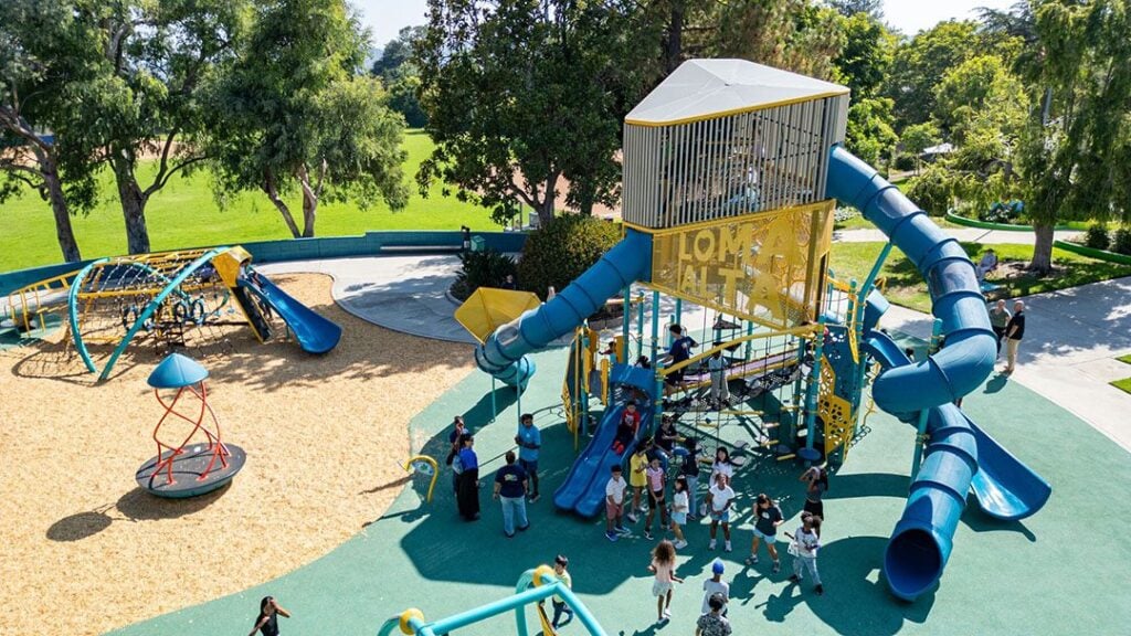 An aerial shot of a colorful, accessible playground from overhead
