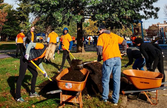 Volunteers help at Norris Square Park Volunteer Service Day at Greater & Greener 2022