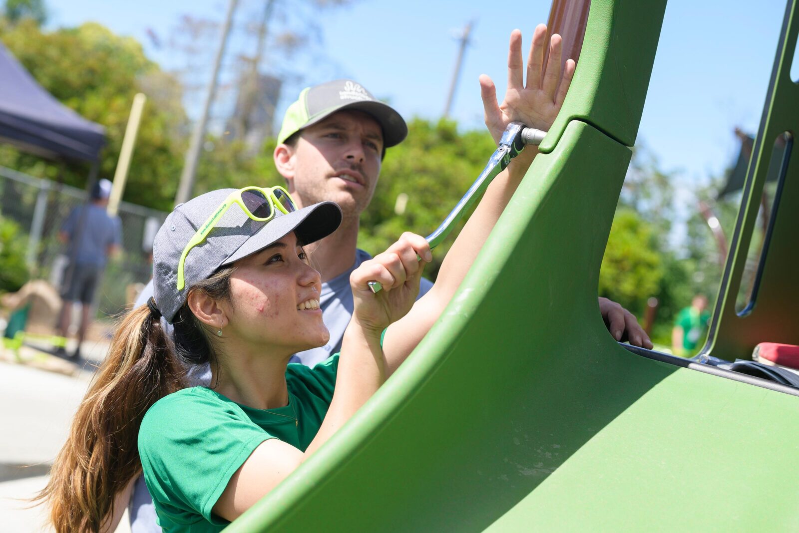 Volunteers building a playground at Greater & Greener Volunteer Service Day