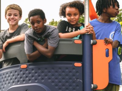 Kid on a playground. Photo courtesy of Eat, Play, Learn PVD