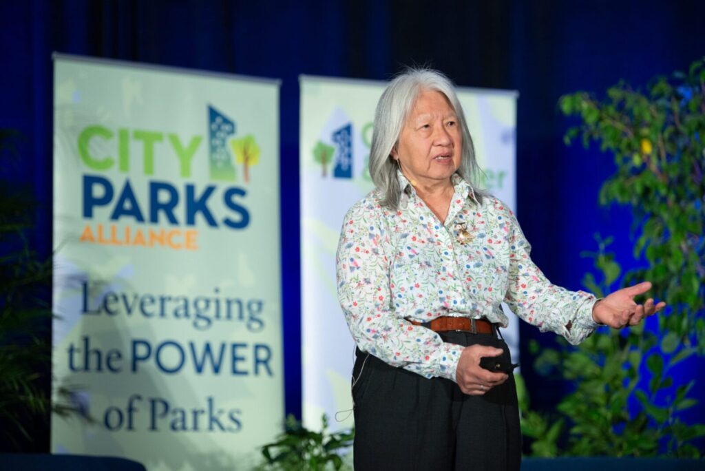 A woman speaking on stage