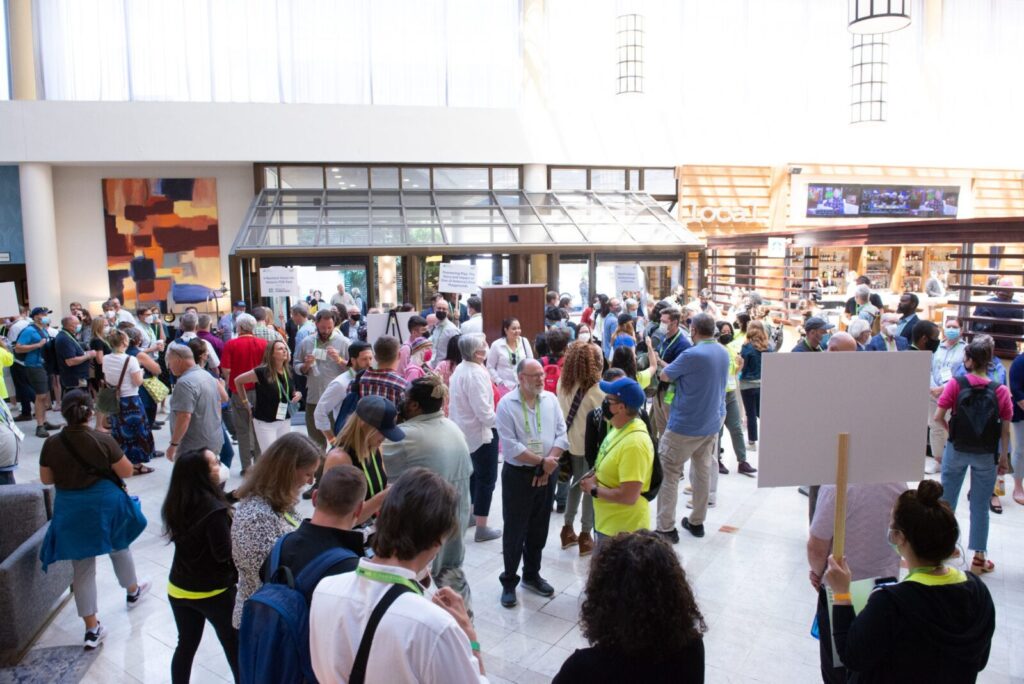 A large group networking in an open hall
