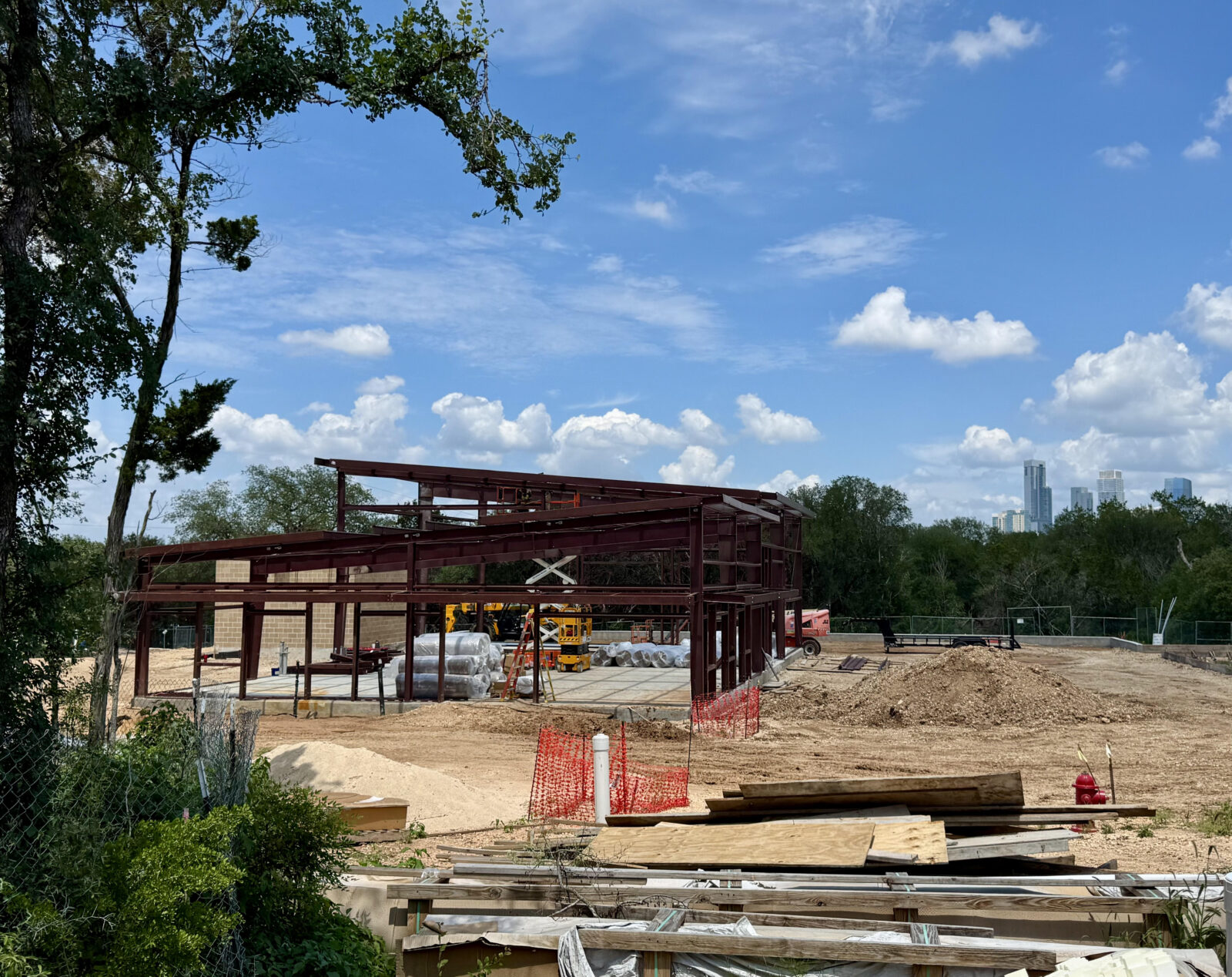 A large construction site with a building framed out