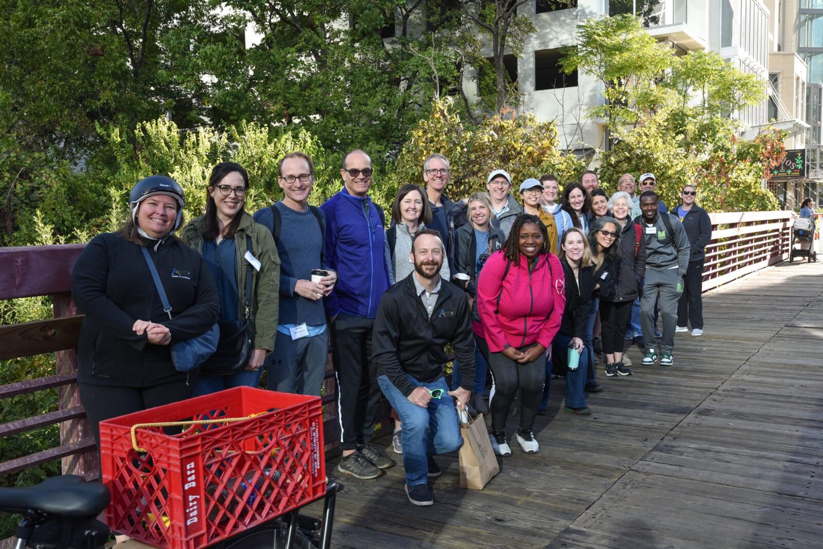 A group of park professionals posing on a walkway