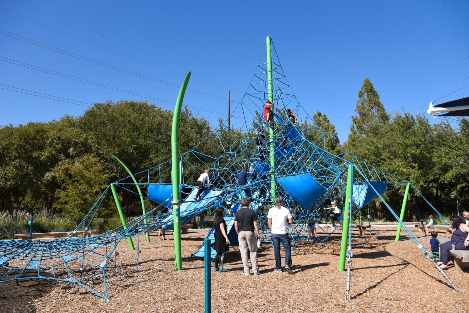 Park professionals playing on a dynamic playground