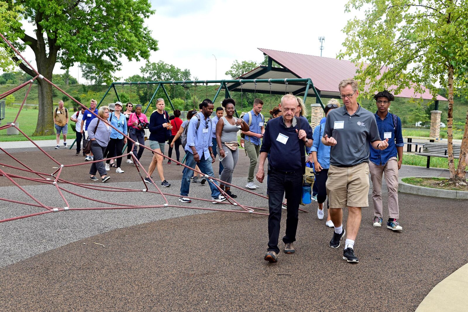 Park Study Tour attendees networking in a Cleveland playground
