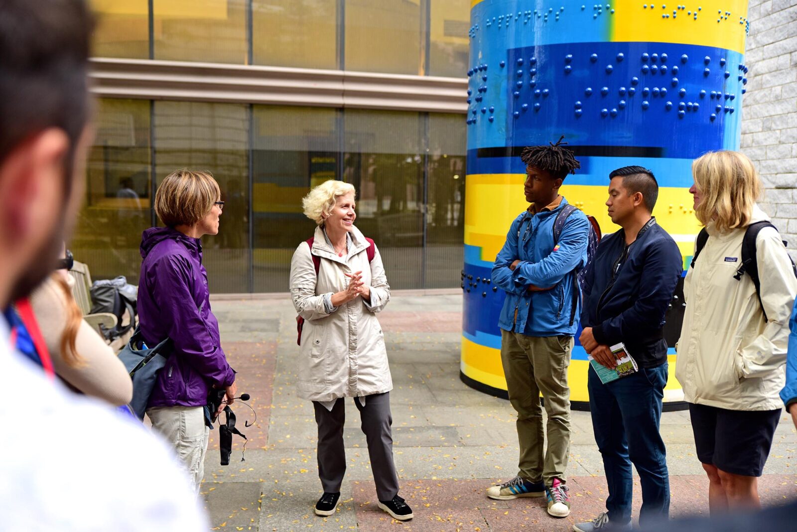 Park Study Tour attendees listening to Catherine Nagel, Executive Director