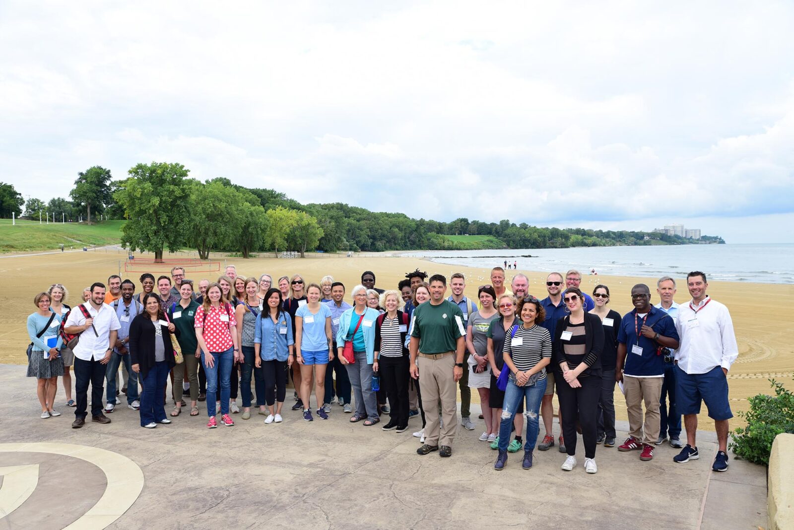 Park Study Tour attendees posing at a beach park