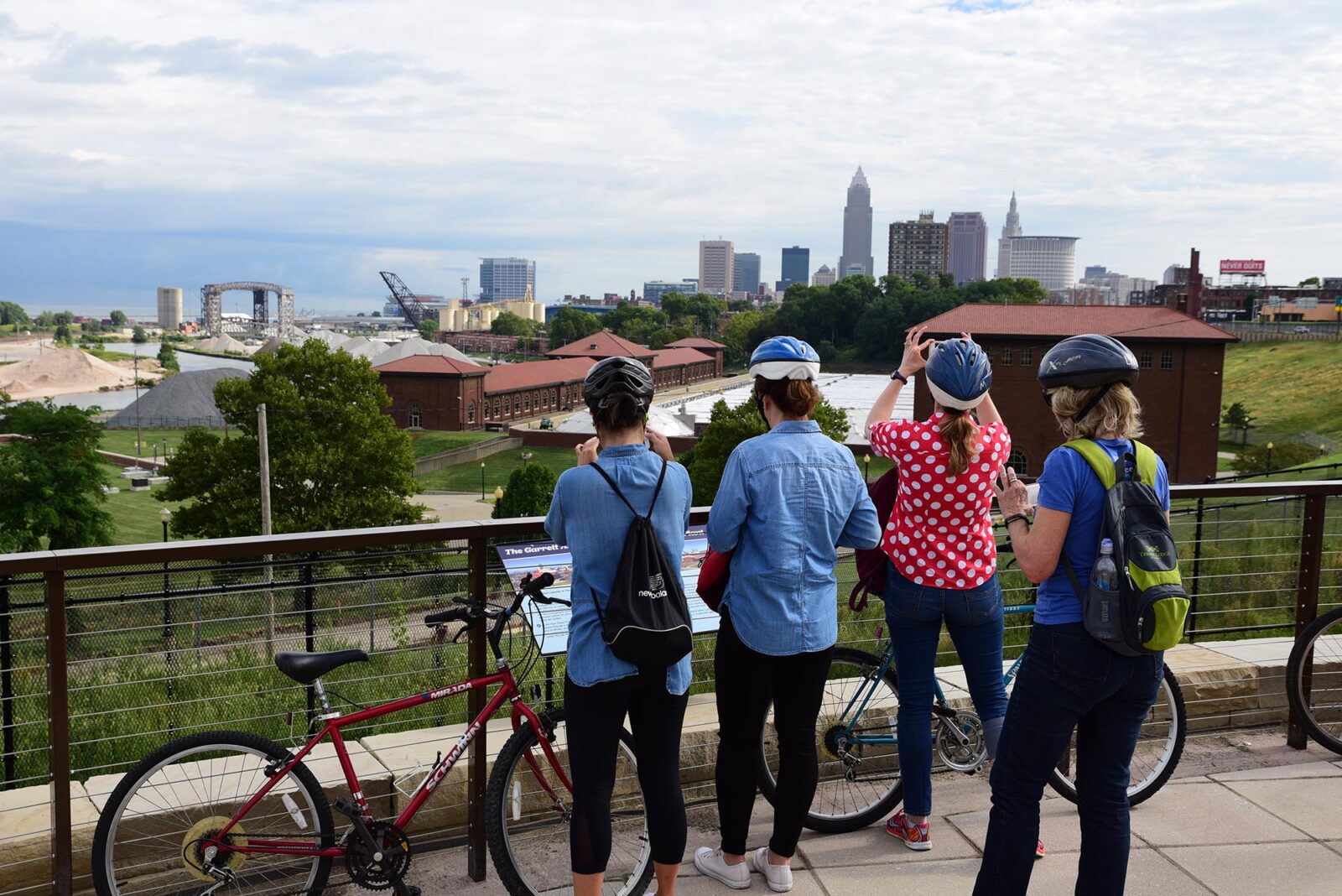 Park Study Tour attendees taking pictures of the Cleveland skyline
