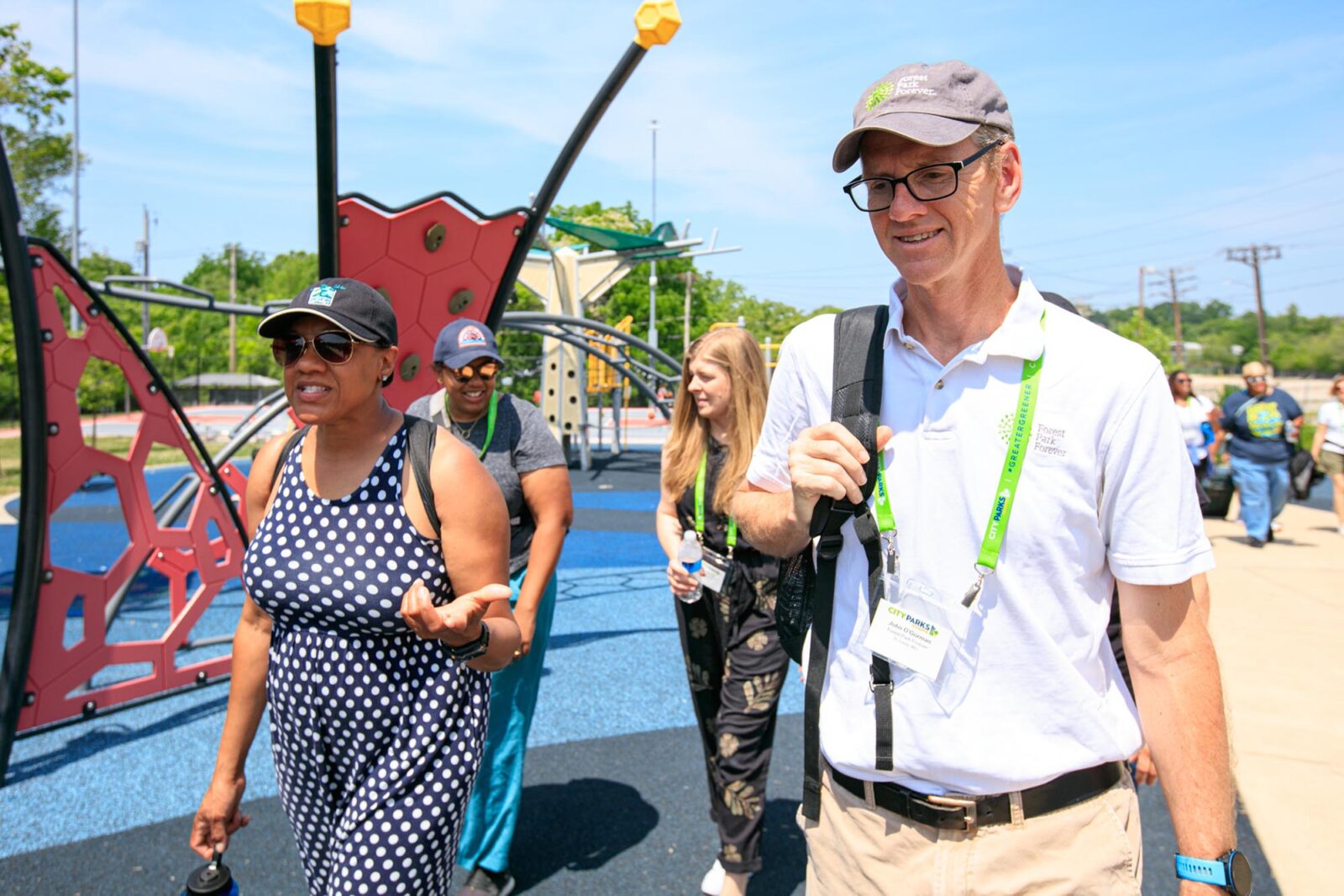 Park Study Tour attendees networking in a playground