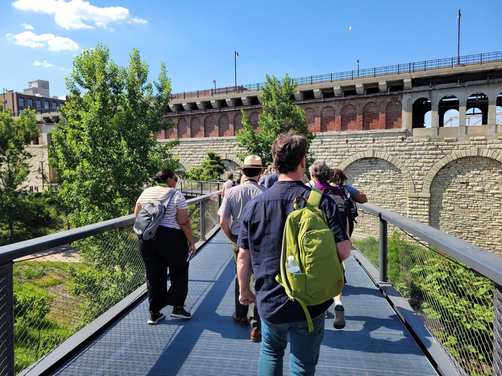 Park Study Tour attendees walking in a city